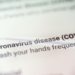 coronavirus disease covid 19 email message on smart phone screen.