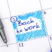 Reminder Back to Work in calendar with blue pen.